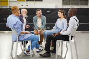 Clients with mental health disorders participate in group therapy sessions using cognitive behavioral therapy cbt at Transformations Treatment Center