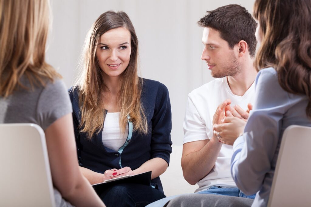 A group therapy session at TMF focused on cognitive behavioral therapy to address mild depression & severe depression