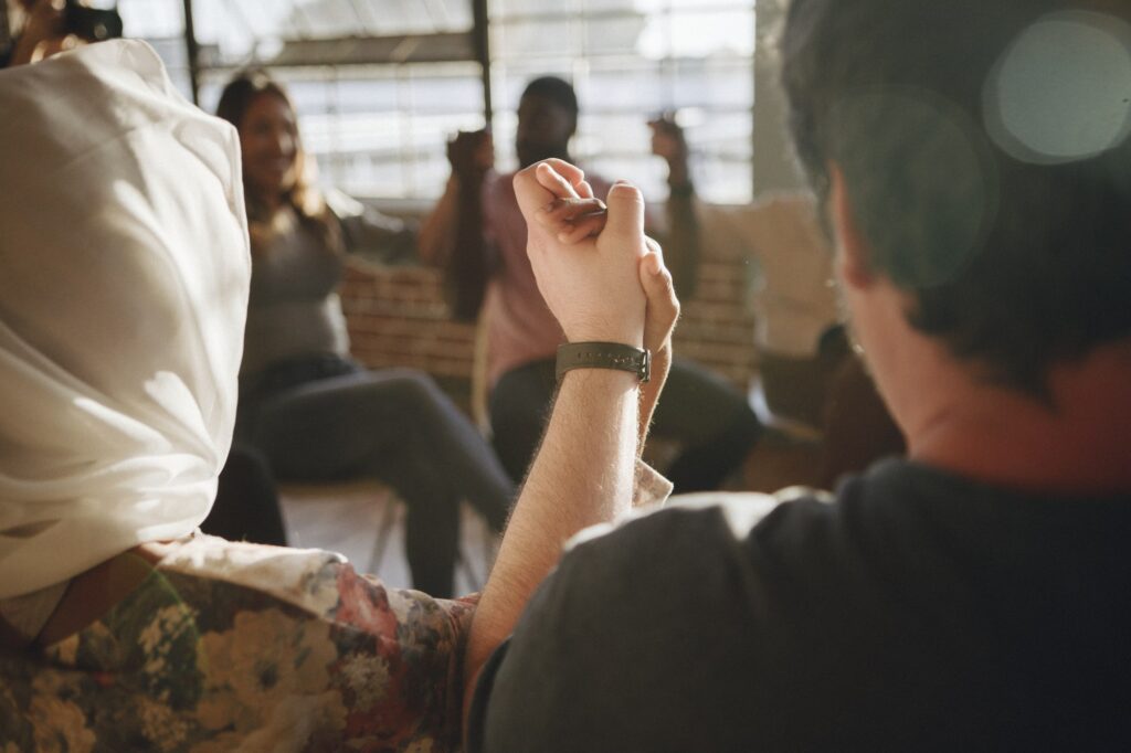 mental health professionals in a group therapy session at Transformations Mending Fences