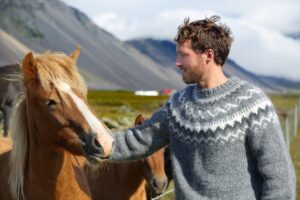 A veteran experiencing the healing process through equine-assisted growth and therapeutic horsemanship